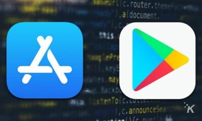 apple app store and google play store logos on blurred background