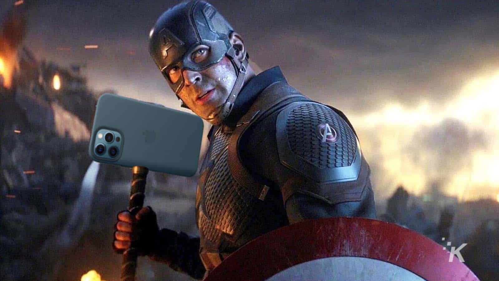 captain america holding thor's hammer but it's an iphone 12