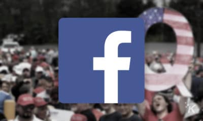 facebook logo with qanon supporters in background