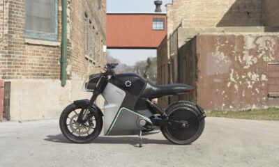 fuell fllow electric motorbike in an industrial neighborhood