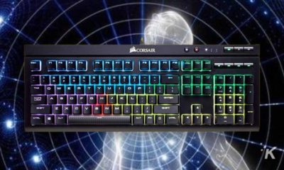 mechanical keyboard on galaxy brain background