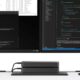 microsoft project volterra mini pc on a desk under two monitors