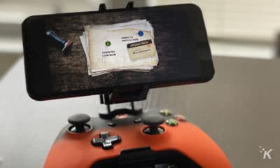 xbox cloud gaming service on a smartphone that is attached to a controller