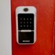 securam eos smart lock on a red door