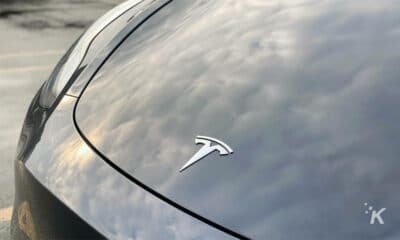 tesla badge on model 3 with full self-driving