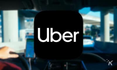 uber logo with blurred background showing driver