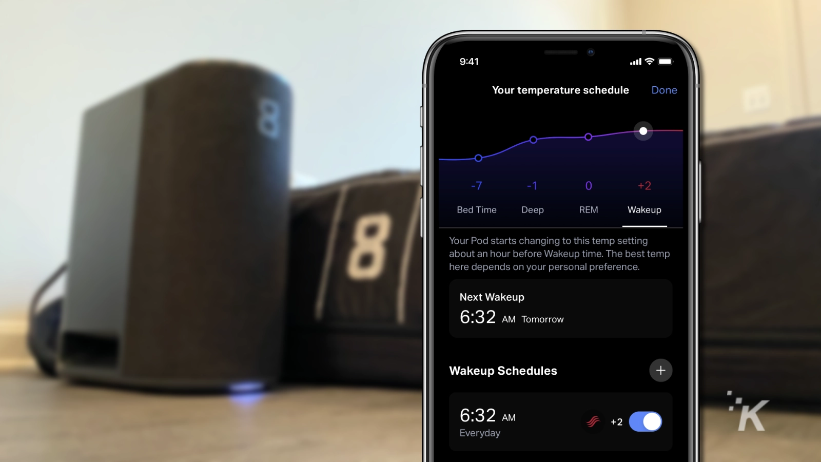 temperature schedule screen of eight sleep app floating over a blurred mattress
