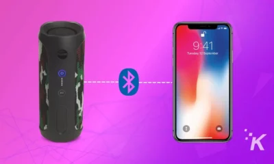 jbl speakers next to iphone showing how to connect