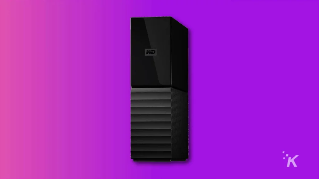 wd mybook external backup drive on purple background